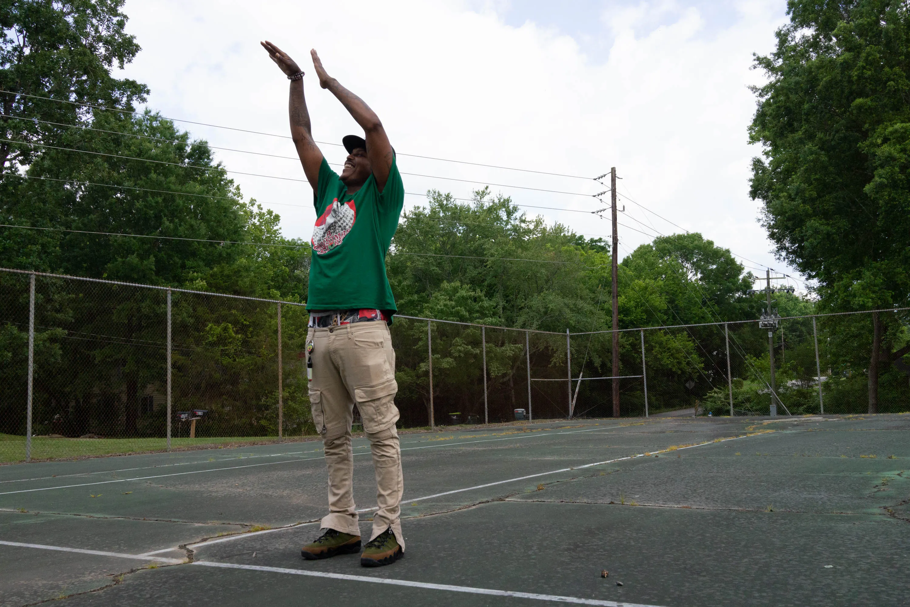 Jason Dunkin throws an imaginary ball at Granville Street Park. Photo by Milton Lindsay, 2023.